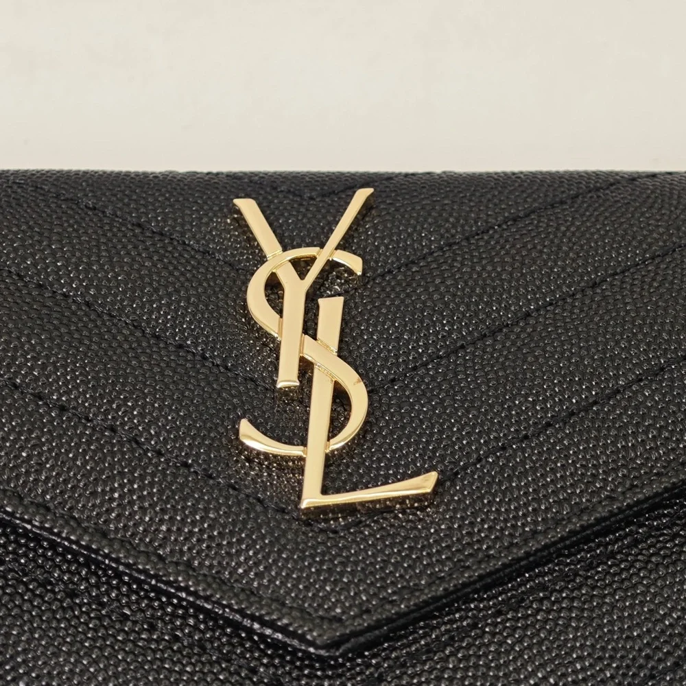 Yves Saint Laurent Quilted Black Clutch with Gold Accent